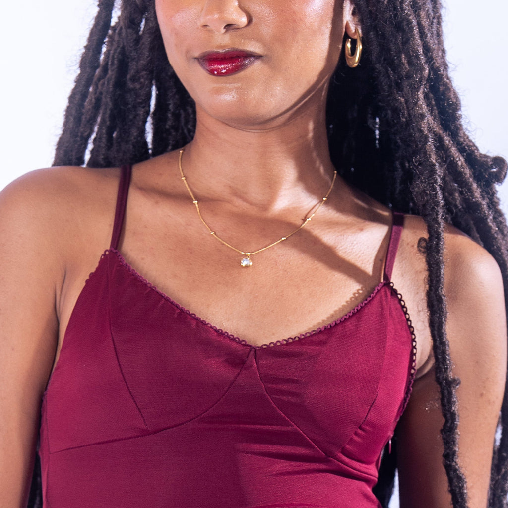 Collier doré perlé avec pendentif