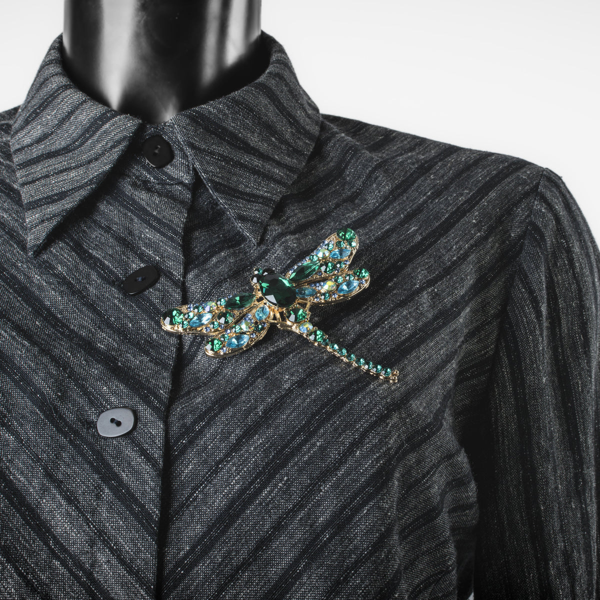 Broche libellule verte ornée de strass