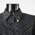Broche fleur noire avec perle pendante
