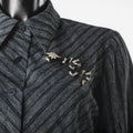 Broche serpent noire et dorée avec strass