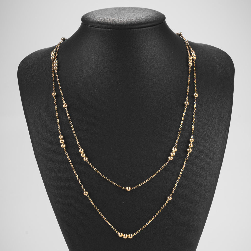 Collier double rang doré à perles