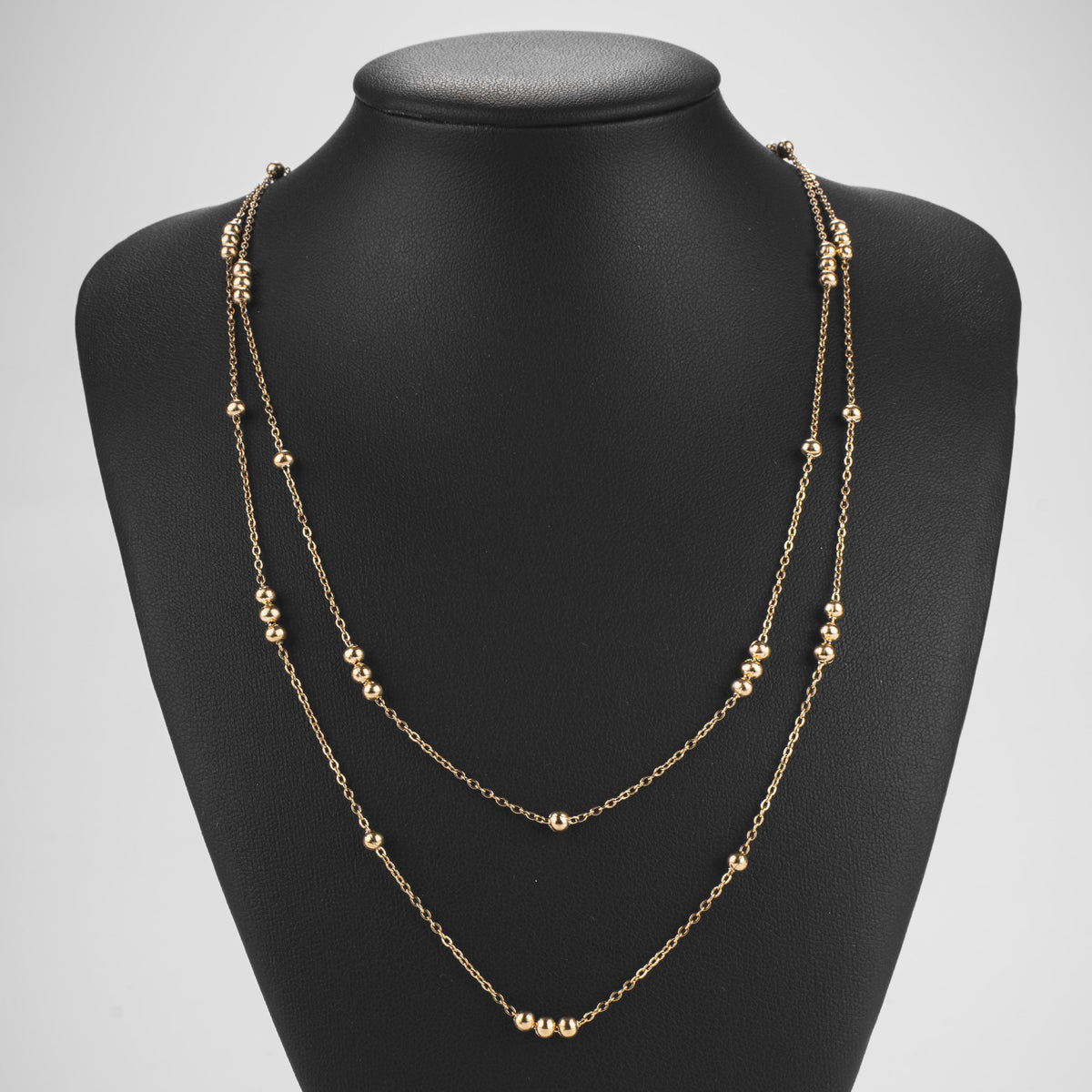 Collier double rang doré à perles