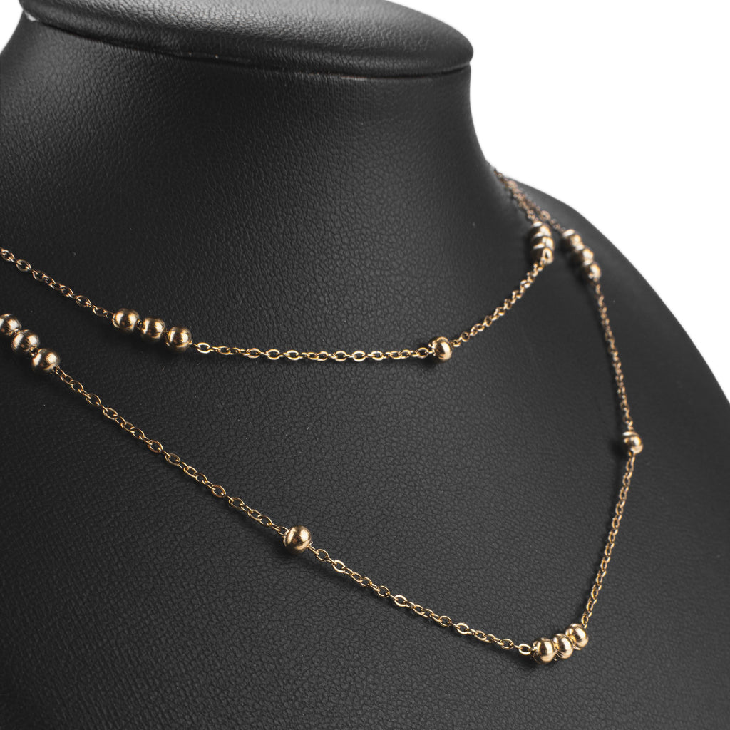 Collier double rang doré à perles