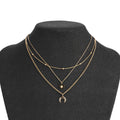 Collier multirangs doré soleil et lune